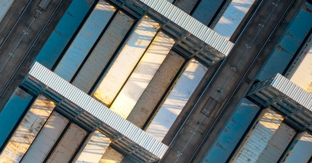 Overhead view of container roofs and terminal lanes illustrating ocean freight capacity planning