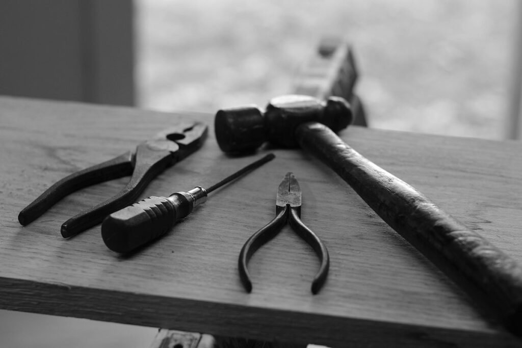 Black-and-white photograph of hand tools